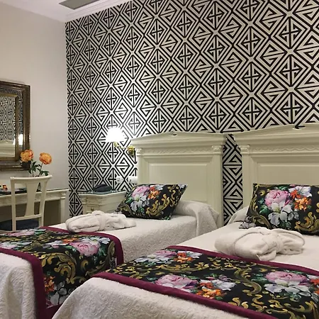 Отель Adriano Boutique